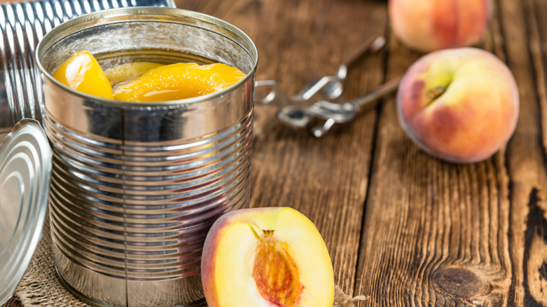 canned peaches on table