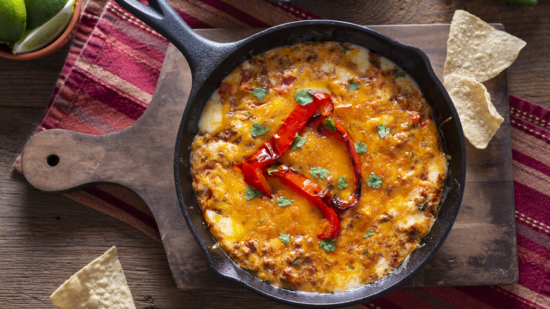 Queso fundido with chorizo in skillet