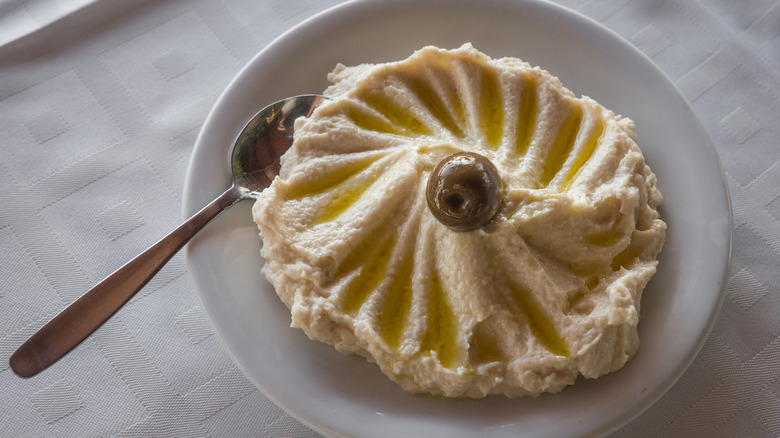 Taramasalata with an olive 