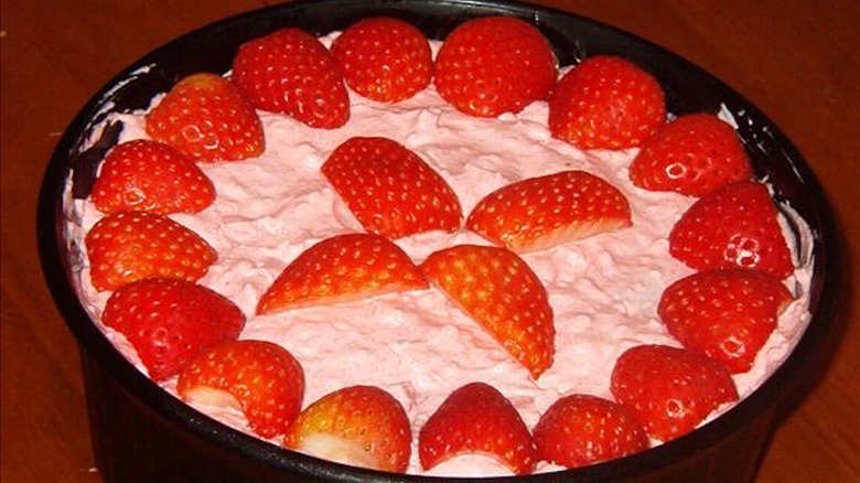 Jello fluff topped with strawberries 