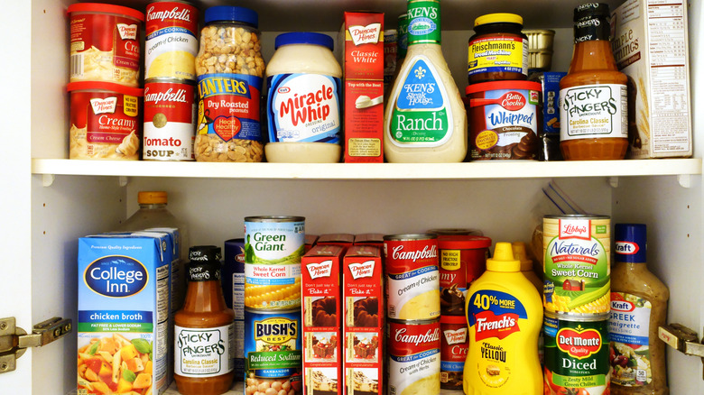 pantry shelves stocked with groceries