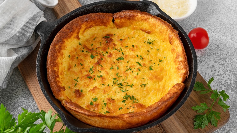 Dutch baby with parsley garnish