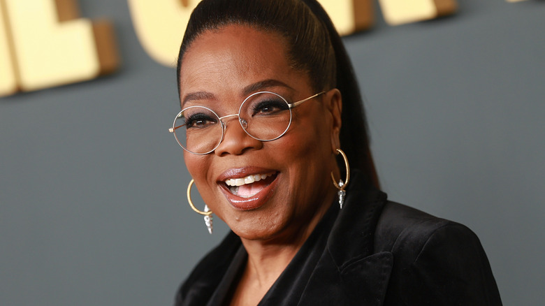 Oprah Winfrey smiling on red carpet