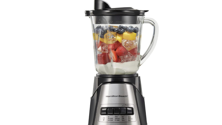 blender with fruit inside
