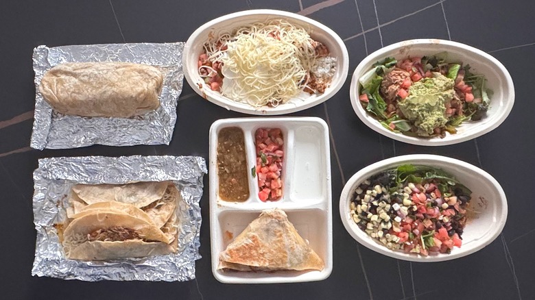 Chipotle burritos and burrito bowls on counter
